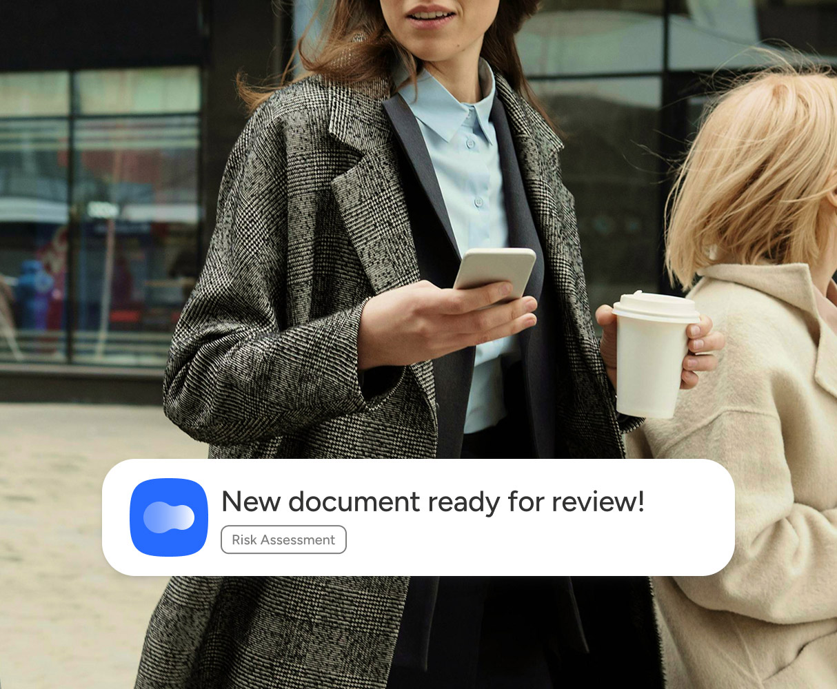 Woman with cell phone in hand