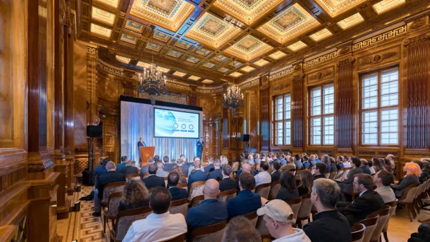 Fabasoft egovday 2024 at the Park Hyatt in Vienna with the keynote speech by Matthias Wodniok and Bastian Drugowitsch in a room full of participants